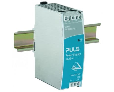 Puls SLAD4.100 PULS SLAD4.100 is a power supply unit designed with a PFC compliant to EN 61000-3-2 standards, featuring a DC-OK relay contact output. It serves as an AS-Interface power supply unit (PSU) and DC/DC-Converter, encased in a robust metal housing. This unit offers screw-clamp connections for secure installation and measures W40mm x H124mm x D102mm. It operates on a supply voltage range of 18Vdc-31.4Vdc, with a nominal 24Vdc, and delivers a rated current of 4A at 30.6Vdc, incorporating a derating curve from 3W/+60°C to +70°C. Designed for DIN rail mounting, it can function within an ambient air temperature range of -25°C to +70°C. The SLAD4.100 has a net width of 40 mm and a peak inrush current consumption of 1.8A. It is compatible with DC networks only and includes protection functions against output overvoltage (up to 36Vdc max.), with an active input inrush current limiter, and overload/short-circuit conditions (min. 5A/max. 12A current). Series or parallel operation is not supported. The output voltage is fixed at 30.6Vdc, with an efficiency of 0.905 at 24Vdc input. Power dissipation/losses are 12.7W at 24Vdc input with full output load. The unit features a 650ms start-up delay, a 100ms rise time under nominal input with constant full current load and 0mF load capacitance, and a 200ms rise time with 5mF load capacitance. Ripple is maintained at 50mVpp across a frequency range of 20Hz to 20MHz at 50Ω.